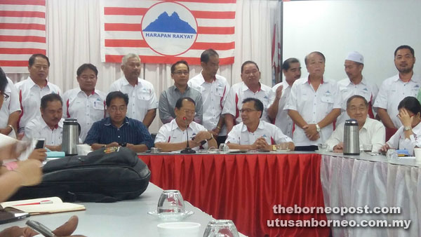 Maijol (seated, third from left) and other supreme council members of the Parti Harapan Rakyat Sabah.