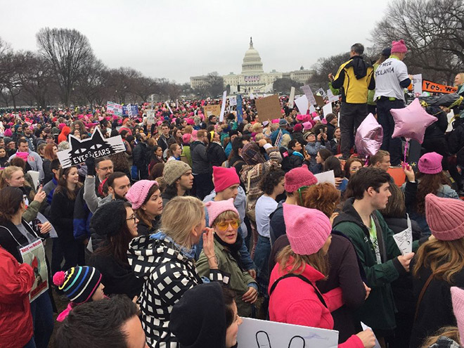 Demonstrators arrive on the National Mall in Washington, DC, for the 'Women's March on Washington' on January 21, 2017