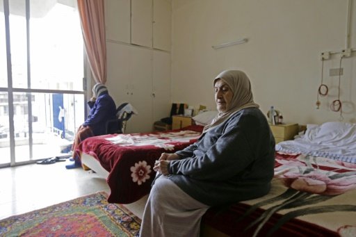 Naz Ashiti, whose three daughters live in Jordan, Germany and Iraqi Kurdistan, says she feels 'humiliated' by her solitude at the Dar al-Saada retirement home in Damascus - AFP/File/Maher Al-Mounes