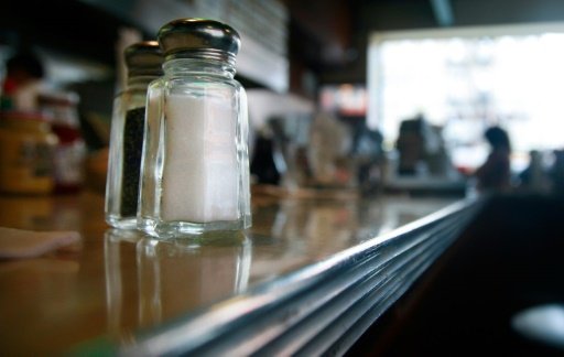 Research shows that national policies to curb salt consumption can reduce the number of people affected by high blood pressure and heart disease . AFP File/Getty