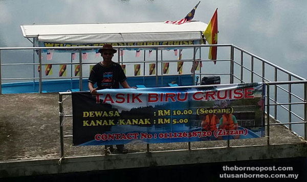 Zizzan, the person employed by Kampung Tasik Biru Cooperatives to handle the cruise boats. 