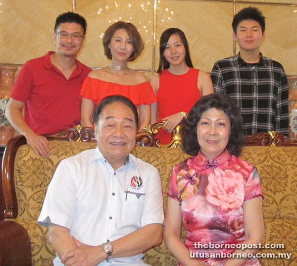 Wong (seated left) and wife Datin Sri Leong Poh Ling with his family at his residence in Sibu during the first day of the Chinese New Year. Standing behind (from left) are Wong’s son Dato Andrew Wong Kee Yew with his wife Datin Li Li Toh and their daughter Natasha Wong and son Sean Wong.