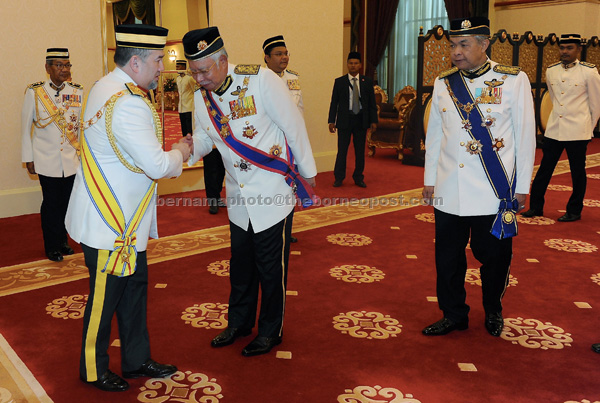 Sultan Muhammad V (left) greeted by Najib at Istana Negara in Kuala Lumpur. At second right is Ahmad Zahid. — Bernama photo