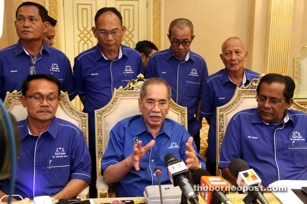 Wan Junaidi (seated centre) speaking at the press conference in PBB headquarters.