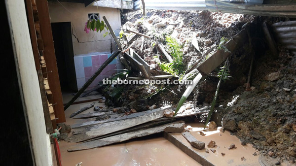 Photo shows the damage caused by the landslide at the bathroom area of a ‘bilik’.