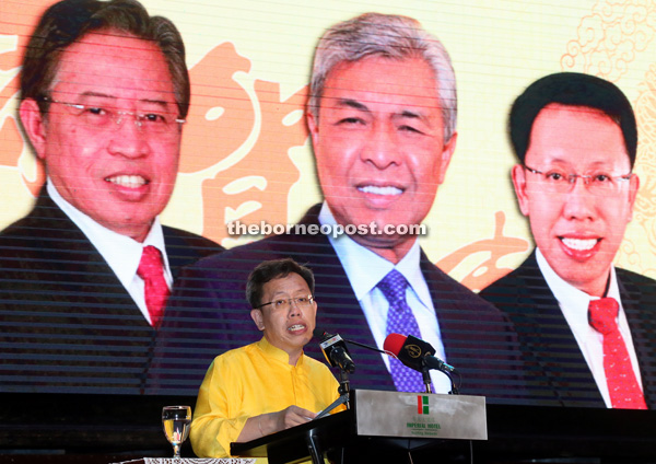 Dr Sim addresses the guests at the Chinese New Year gathering in Kuching.