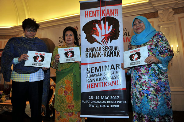 Rosmah (centre) at the pre-launching event and press conference on the seminar on Child Sexual Crime: Stop! at Seri Perdana in Putrajaya. Also seen are Minister in the Prime Minister’s Department Datuk Seri Azalina Othman Said (left) and Women, Family and Community Development Minister Datuk Seri Rohani Abdul Karim. — Bernama photo