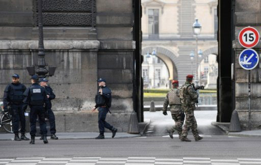 Police and soldiers patrol outside the Louvre on February 3, 2017 in Paris - AFP file photo