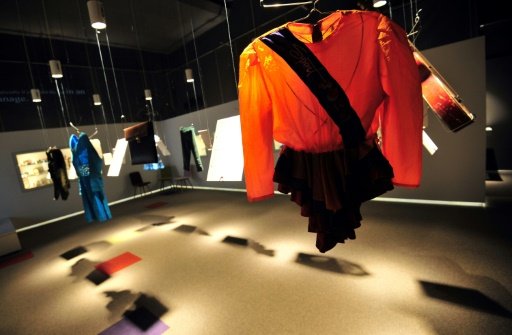 Children's clothes are displayed at Sarajevo's newly opened 'War Childhood Museum' - AFP/