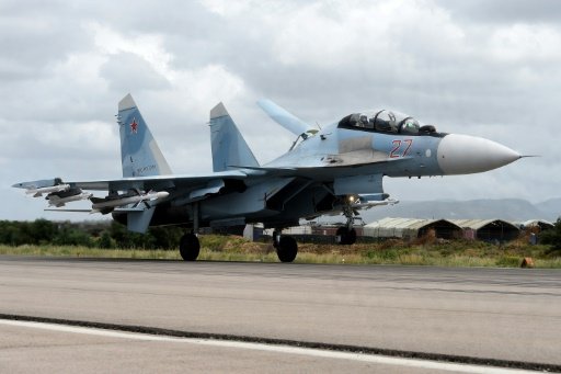 A Russian Sukhoi Su-35 bomber lands at the Russian Hmeimim military base in Latakia province, in the northwest of Syria on May 4, 2016  -AFp photo