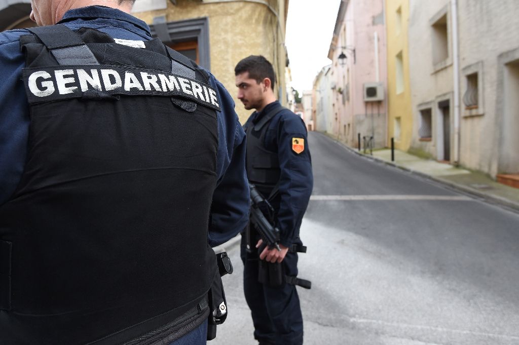 Gendarmes stand guard in a street of Marseillan in southern France, on February 10, 2017, where suspects believed to be involved in plotting an attack were arrested by French anti-terrorist police. AFP Photo