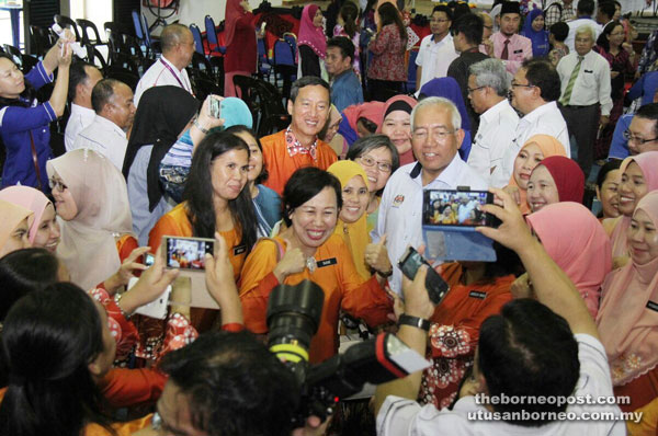 Mahdzir in a photo session with the teachers who attended the launching of the state-level GA1M at SMK Lundu yesterday. — Photo by Chimon Upon