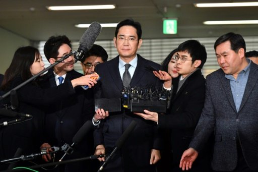 Lee Jae-yong (centre), vice chairman of Samsung Electronics, has been questioned multiple times over his role in the corruption scandal surrounding South Korea's President Park Geun-Hye. AFP Photo
