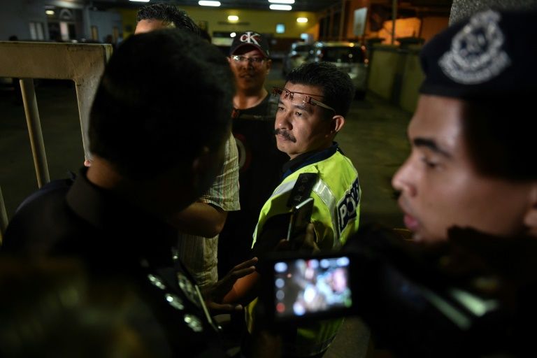 Malaysian police are detaining a woman holding a Vietnamese passport and seeking further suspects in the killing of Kim Jong-Nam, the half-brother of North Korea's leader. AFP Photo