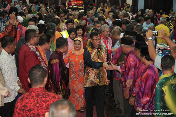 Abang Johari and Juma’ani receive a rousing welcome upon their arrival at the CNY gathering in Limbang.