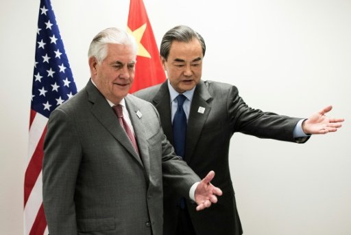 US Secretary of State Rex Tillerson (L) and China's Foreign Minister Wang Yi meet on the sidelines of athe G20 in Bonn, western Germany, Feb 17, 2017. AFP Photo