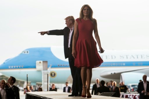 US President Donald Trump and First Lady Melania Trump arrive at a rally at the Orlando Melbourne International Airport on Feb 18, 2017 in Melbourne, Florida.