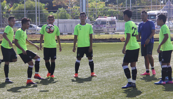 The Sarawak players warming up before a training session.