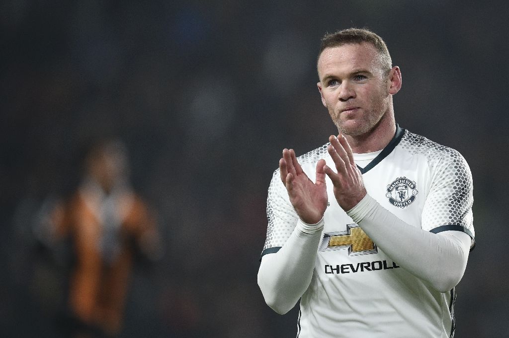 Manchester United's striker Wayne Rooney said in a statement, "I want to end recent speculation and say that I am staying at Manchester United". AFP Photo