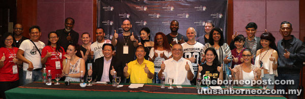 (Seated from right) Paris, Dr Safrina, Yii, Ting, Teo, Isabelle, and Gupson (back row – second left) with international artistes and the festival organising committee.   