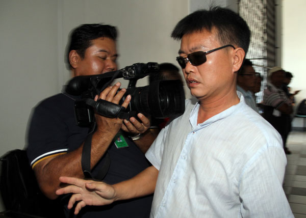 Leong exiting the court after the Magistrate’s Court fixed March 13 for a re-mention of the case involving the owner of the catamaran that capsized while heading to Pulau Mengalum. — Bernama photo    