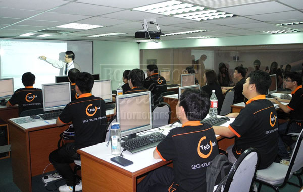 WELL-EQUIPPED: SEGi Sarawak students during a lesson. 