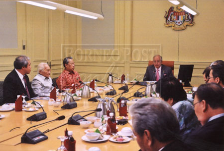 DISCUSSING STRATEGIES : Prime Minister Datuk Seri Najib Tun Razak chairing the BN management meeting in Putrajaya on Thursday in the presence of Deputy Prime Minister Tan Sri Muhyiddin Yassin (third left), Taib (second left) and Awang Tengah (left).