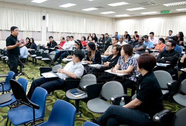 INNOVATIVE SOLUTIONS: Eng Hoo addresses the workshop participants.