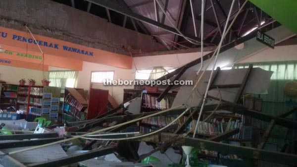 Ceiling from the second-floor library of SMK Agama Mohamad Ali collapsed following the aftershock yesterday morning.