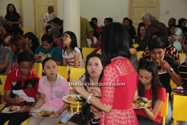 Visitors enjoying the food. 