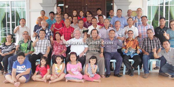 (From fifth left, seated) Fr Sepp, Fr Jepy, Henry, Pemanca Daniel Teho and Vincent join the others as they strike their best poses for a group photograph.