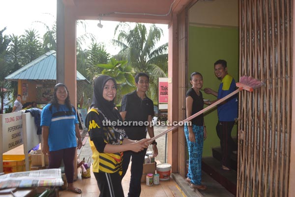 Teachers do their part to clean the school. 