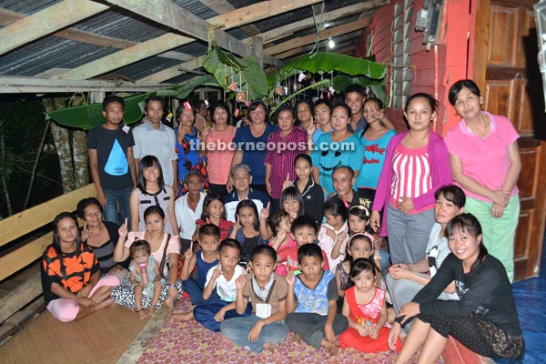  The folks of Rumah Ravica in Meradong with Ding (seated back row, third from left).