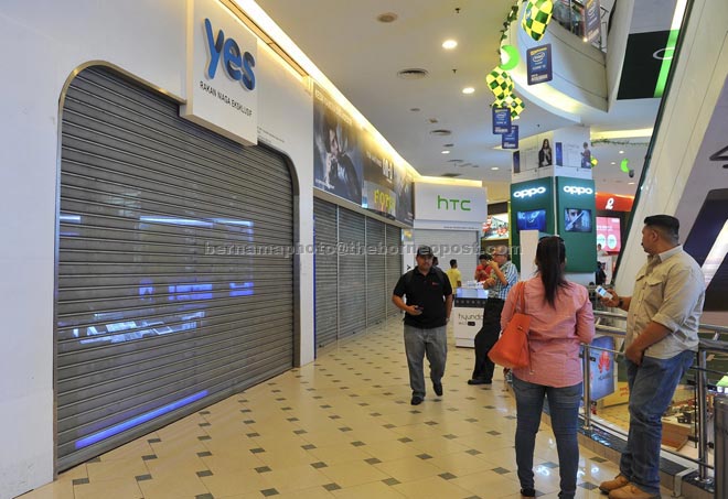 A shop at Low Yat Plaza closed down after the July 13 incident. — Bernama photo