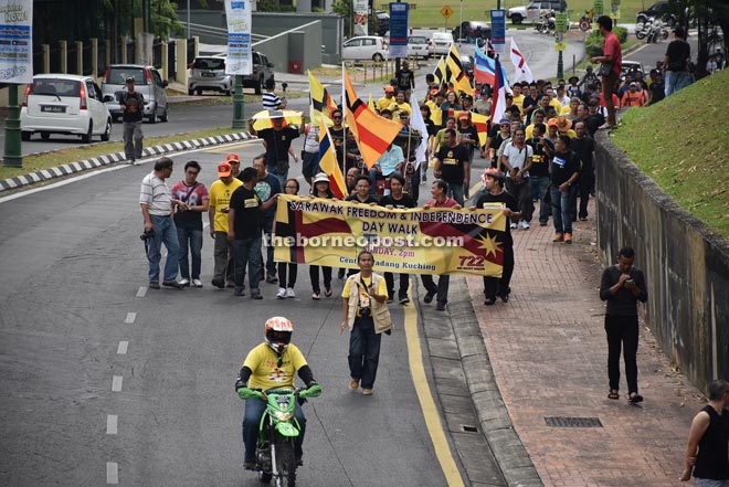 A section of the participants during the ‘Sarawak Freedom and Independence Day Walk’ yesterday.