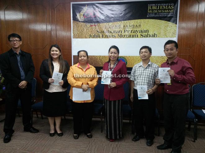 Joanna (third right) and her staff promoting the exhibition.