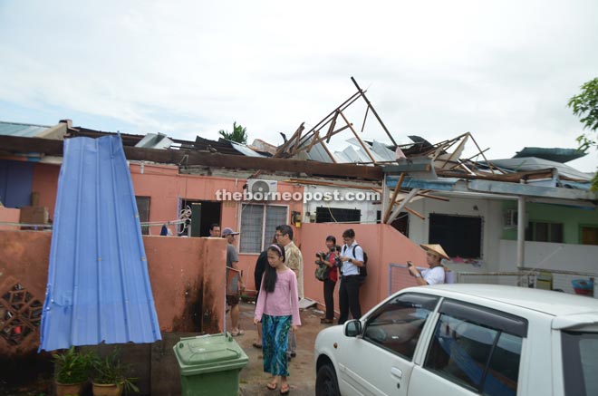  The roofs of these low-cost houses in Tudan were blown off by the freak weather.