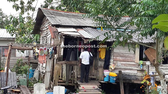 File photo shows the old dilapidated wooden house. — Photo from Datin Lianey Chia