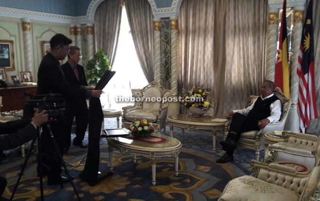Adenan (right) being interviewed by WCS on July 27 at his office in Wisma Bapa Malaysia. 