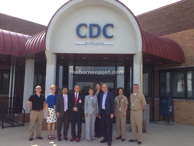 (From third left) Niosh executive secretary Ayop Salleh, Riot and Lee (third right) with their American hosts at the CDC.