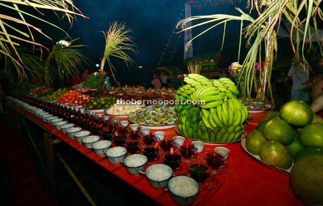 The offering of food and kopi-O is a common practice during the Hungry Ghost Festival in Sibu. 