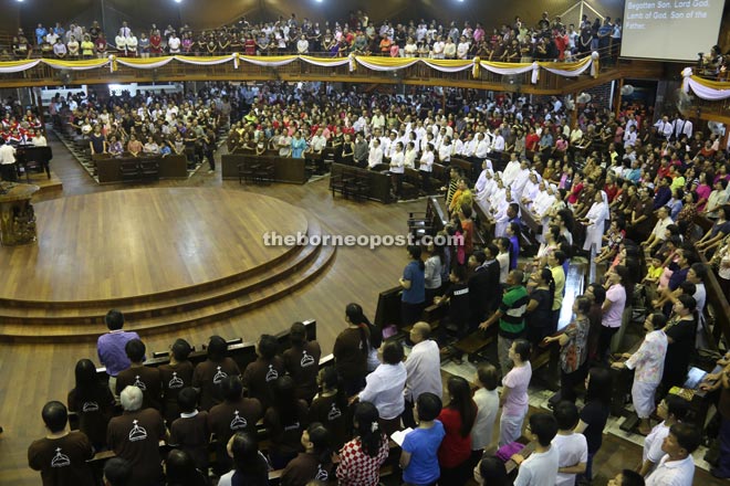 Thousands of faithful congregate at the Thanksgiving Re-dedication Mass at Sacred Heart Cathedral.