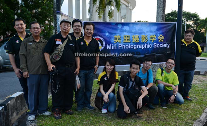 Wong (fifth left) poses with some of the participating photographers.