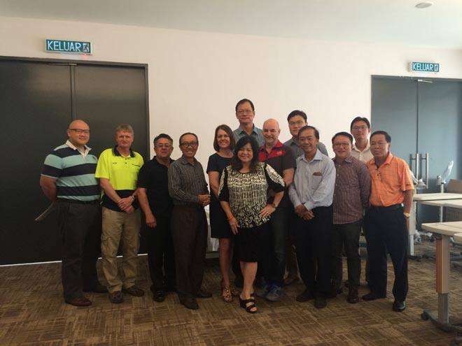 Fong (third right) with Welling (fifth right), John Chin, charmain of EOTP (fourth left), Smith (second left), Hee (third from left), Bonny (fifth left), Michael Fields, deputy chairman of Optimum Aged Care Systems (fourth from right) and at the back: Quek Siew Hau, managing director of Wah Mie Group (third right).