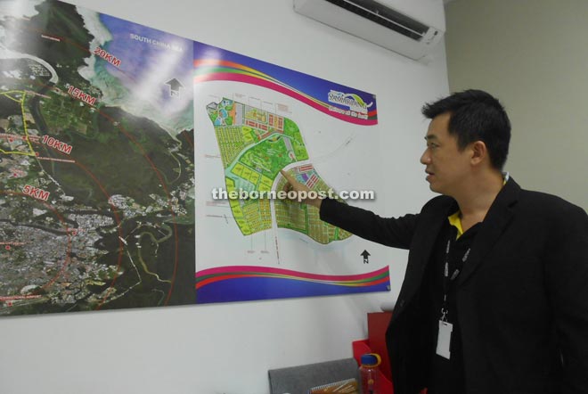 Yoong showing the project plan at his office in Semariang yesterday.
