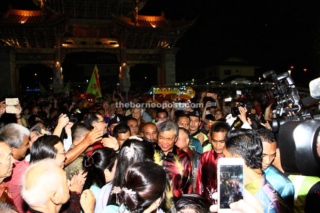 Zahid greets the crowd upon his arrival at the event.