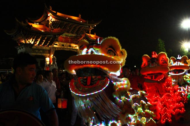 Lion dance performers take part in the procession to celebrate the occasion.
