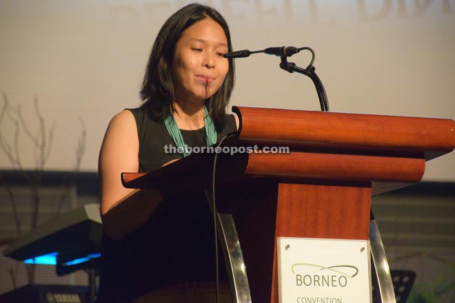 Co-founder Elaine Chan speaks at BFM’s benefit dinner.
