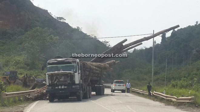 Lorry hantu drivers often overload their heavy vehicles with huge and long logs.