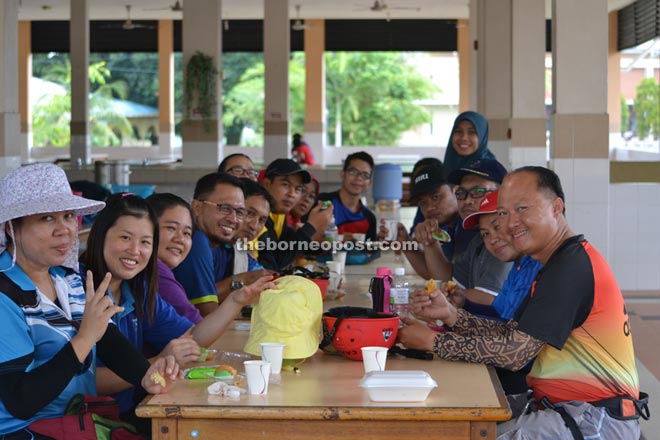 Empari (right) with teachers, coaches and camp trainers taking a break at the camp.